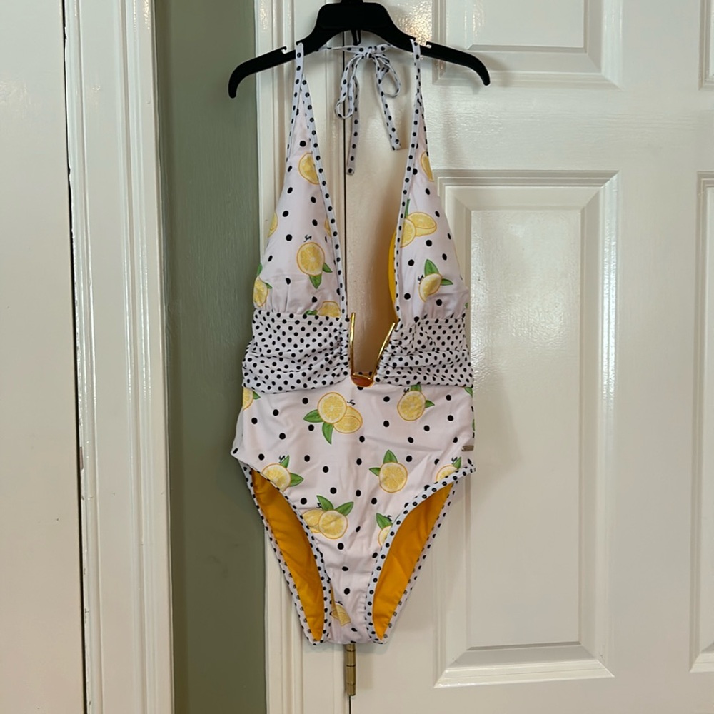 Size small lemon one piece Juicy Couture bathing suit.  New, liner on, tag fell
